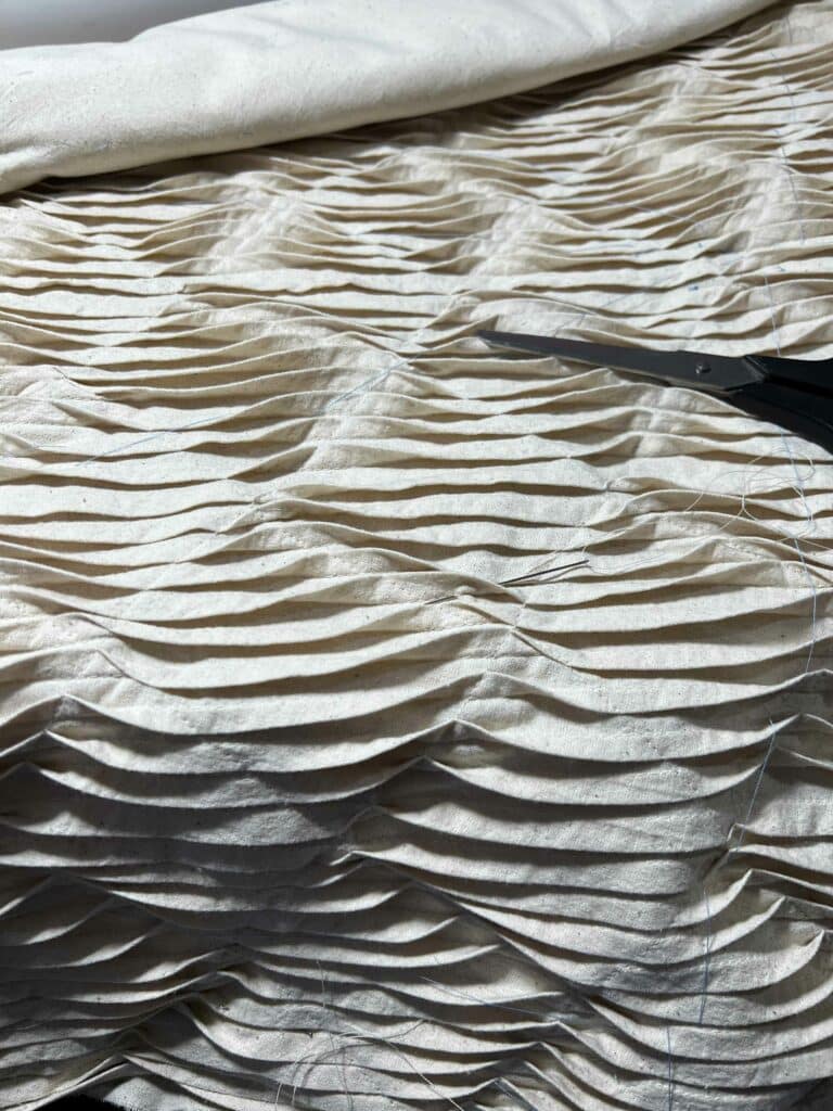 Hand finishing edges.